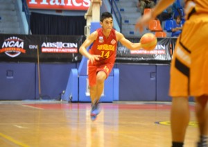 Kobe Canoy takes hand on the ball to set the play for the Staglets.