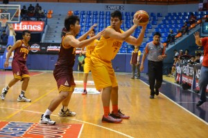 Niko Sisa posts up against Rocero of Junior Altas to try and find an open man.